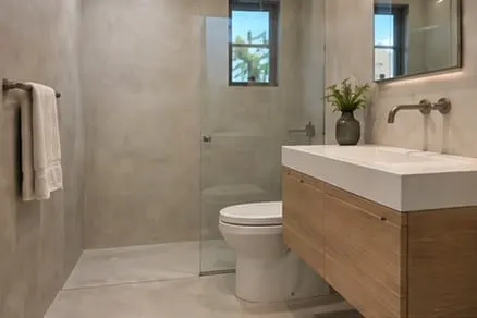 Illustrative bathroom with continuous microcement surfaces
