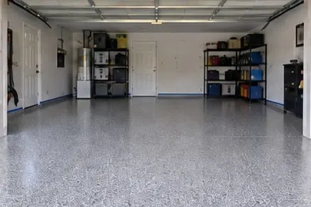 Illustrative garage with a gray flake epoxy floor