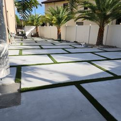Microcement vs concrete driveway in Hollywood FL showing seamless microcement finish and traditional concrete option
